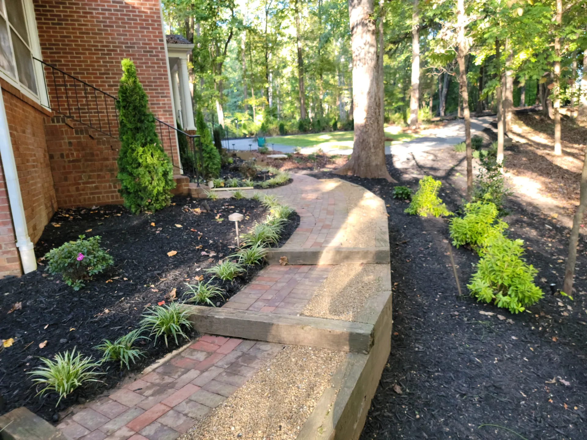 Paver walkway with retaining wall